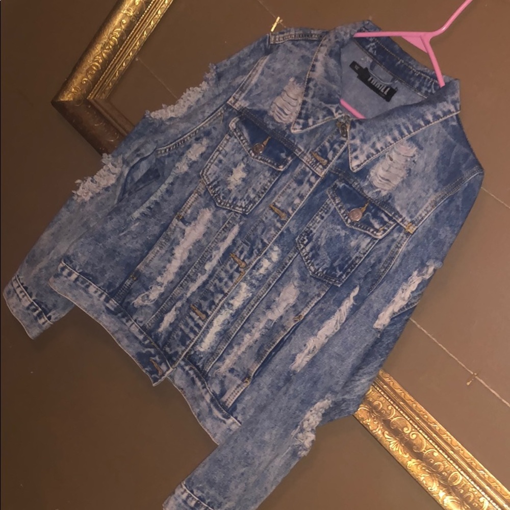Distressed jean jacket